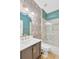 Elegant bathroom showcasing a sink vanity and glass enclosed shower at 19246 Meadow Pine Dr, Tampa, FL 33647