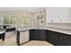 Stylish kitchen featuring stainless steel appliances, granite countertops, and a breakfast bar at 19246 Meadow Pine Dr, Tampa, FL 33647