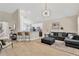 Bright and airy open-concept living space with views of the kitchen and dining area at 19246 Meadow Pine Dr, Tampa, FL 33647