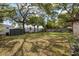 Large, fenced backyard features mature trees and plenty of room to relax at 2167 Euclid E Cir, Clearwater, FL 33764