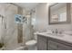 Beautiful bathroom features include a glass shower, large-format tiles, and a modern vanity at 2167 Euclid E Cir, Clearwater, FL 33764