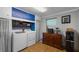 Utility room featuring a washing machine, dryer and lots of storage space at 2167 Euclid E Cir, Clearwater, FL 33764