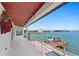 A spacious balcony offers picturesque water views at 2250 Donato Dr, Belleair Beach, FL 33786