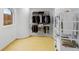 Well-organized walk-in closet featuring custom shelving and ample storage for clothes and accessories at 2250 Donato Dr, Belleair Beach, FL 33786