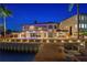 Waterfront property with pool and private dock, perfect for entertaining under the stars at 2250 Donato Dr, Belleair Beach, FL 33786