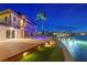 Backyard with pool, deck, and boat dock providing access to the waterfront at 2250 Donato Dr, Belleair Beach, FL 33786