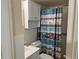 The bathroom features a sink with storage, a shower and tub combo, and decorative curtain at 2434 Australia E Way # 22, Clearwater, FL 33763