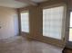 Bright living room featuring tile flooring with natural light, offering a comfortable and airy space at 2434 Australia E Way # 22, Clearwater, FL 33763