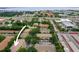 Aerial view shows the unit and nearby roadways, self-storage, and community parking spaces at 2529 Harn Blvd # 2, Clearwater, FL 33764