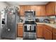 Cozy kitchen featuring stainless steel appliances, wood cabinets and counter appliances at 2529 Harn Blvd # 2, Clearwater, FL 33764