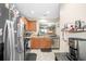A compact kitchen space with stainless steel appliances and stylish counter decor at 2529 Harn Blvd # 2, Clearwater, FL 33764