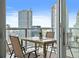 Balcony with outdoor dining set and city views, perfect for entertaining at 301 1St S St # 2305, St Petersburg, FL 33701
