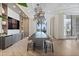 The condo features a dining room with a large table, chairs, and views of the ocean at 301 1St S St # 2305, St Petersburg, FL 33701