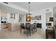 Open-concept kitchen and dining area with pendant lighting and modern decor at 301 1St S St # 2305, St Petersburg, FL 33701
