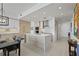 Spacious kitchen with a large island, stainless steel appliances, and contemporary lighting fixtures at 301 1St S St # 2305, St Petersburg, FL 33701