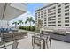 Elegant outdoor seating area with a built-in grill, perfect for entertaining and enjoying outdoor living at 301 1St S St # 2305, St Petersburg, FL 33701