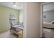 Comfortable bedroom features a ceiling fan and neutral colored walls at 32201 Brookstone Dr, Wesley Chapel, FL 33545