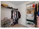 Organized walk-in closet with clothes racks and shelving provides ample storage space at 32201 Brookstone Dr, Wesley Chapel, FL 33545