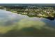 An aerial shot of 333 Bay Place in Safety Harbor, FL, situated along a picturesque waterfront at 333 Bay Pl, Safety Harbor, FL 34695