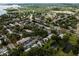 An aerial view showcases the community at 333 Bay Place, Safety Harbor, with ponds and mature trees at 333 Bay Pl, Safety Harbor, FL 34695