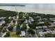 Aerial view of 333 Bay Place, Safety Harbor, FL 34695, highlighting lush landscaping, pond, and nearby waterfront at 333 Bay Pl, Safety Harbor, FL 34695