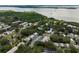 Aerial view of 333 Bay Place, Safety Harbor, FL 34695 showcasing homes, green spaces, and proximity to the water at 333 Bay Pl, Safety Harbor, FL 34695