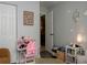 Inviting bedroom with a cozy desk and a neatly arranged bookshelf at 333 Bay Pl, Safety Harbor, FL 34695