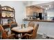 Dining area open to the kitchen, creating a seamless and social living space at 333 Bay Pl, Safety Harbor, FL 34695