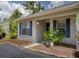 Attractive single-story home with blue shutters, neat landscaping, and a well-kept front entrance at 333 Bay Pl, Safety Harbor, FL 34695