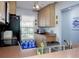 A bright kitchen showcases stainless steel appliances, wood cabinets, and a window with natural light at 333 Bay Pl, Safety Harbor, FL 34695