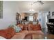 Open-concept living room with a view of the kitchen, highlighting a bright and airy living space at 333 Bay Pl, Safety Harbor, FL 34695