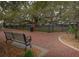 Peaceful park setting with a bench under a sprawling tree, offering a quiet retreat at 333 Bay Pl, Safety Harbor, FL 34695