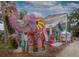 A colorful exterior and bright artwork are on display, creating a whimsical and inviting street scene at 333 Bay Pl, Safety Harbor, FL 34695
