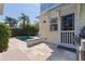 Backyard patio and pool with outdoor grill, and manicured landscaping at 341 14Th Ave Ne, St Petersburg, FL 33701