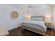 Cozy bedroom with wood floors, ceiling fan, and plenty of natural light at 341 14Th Ave Ne, St Petersburg, FL 33701
