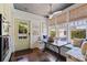 Bright breakfast nook with built-in seating, farmhouse table, and plenty of natural light at 341 14Th Ave Ne, St Petersburg, FL 33701