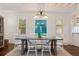 Dining room featuring modern light fixture and wooden table set, bright and inviting space at 341 14Th Ave Ne, St Petersburg, FL 33701