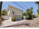 Exterior of home featuring a garage, green lawn and lush landscaping and brick paved street at 341 14Th Ave Ne, St Petersburg, FL 33701