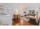 Bright living room with wood floors, a dining area, comfortable seating and natural light at 341 14Th Ave Ne, St Petersburg, FL 33701