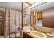 Bathroom featuring a vanity and a shower behind a shell-themed shower curtain at 34125 Chancey Rd, Wesley Chapel, FL 33543