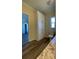 Bright bathroom with natural light, a tall built-in linen closet and neutral decor at 3722 Binnacle Dr, Tampa, FL 33611