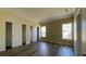 Spacious bedroom featuring hardwood-style floors and two large, separate closets at 3722 Binnacle Dr, Tampa, FL 33611