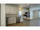 Modern kitchen with stainless steel appliances, granite countertops and island at 3722 Binnacle Dr, Tampa, FL 33611