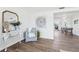 Inviting living room showcasing stylish decor, hardwood floors, and lots of natural light at 3813 Luma Dr, Holiday, FL 34691