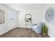 Bright living area with wood floors, neutral walls, and modern decor at 3813 Luma Dr, Holiday, FL 34691