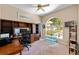 Home office featuring a large window, built-in shelving, and a comfortable workspace at 4022 Valrico Grove Dr, Valrico, FL 33594