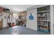 Well-organized garage with storage shelves, work area, and a clean, functional design at 4915 Pennsbury Dr, Tampa, FL 33624