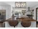 Bright kitchen with a large island, stainless steel appliances, and open shelving at 4915 Pennsbury Dr, Tampa, FL 33624