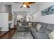 Spacious living room with a view to an open kitchen and modern design at 4915 Pennsbury Dr, Tampa, FL 33624