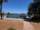 Backyard waterfront view with a private dock at 510 64Th Ave, St Pete Beach, FL 33706